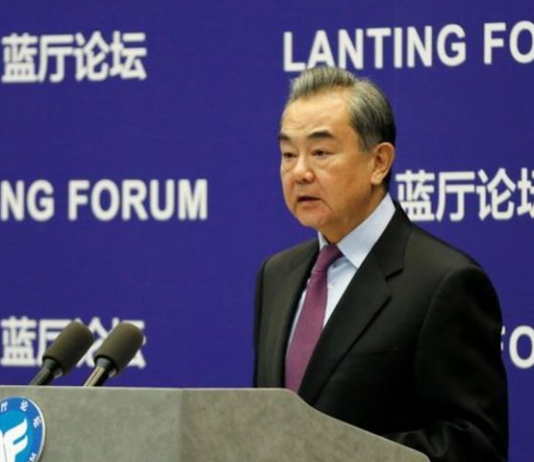 China denies massacre charge in Xinjiang, says door open to UN