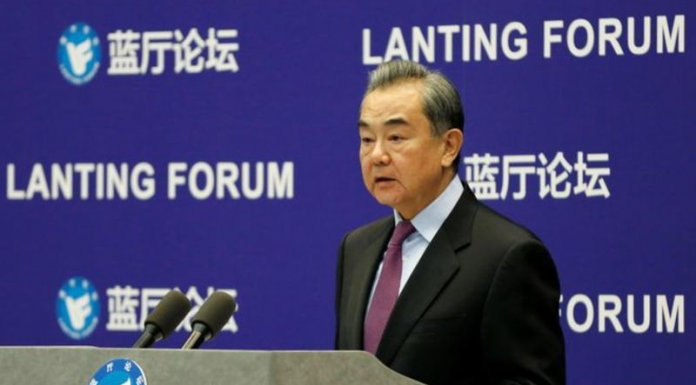 China denies massacre charge in Xinjiang, says door open to UN